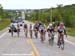 The wind spread riders across the road in an echelon  		CREDITS:   		TITLE: Tour de Beauce  		COPYRIGHT: Rob Jones/www.canadiancyclist.com