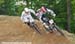 Dan Atherton and Romain Saladini in 1/4 finals  		CREDITS:   		TITLE: Bromont World Cup  		COPYRIGHT: ROB JONES/CANADIAN CYCLIST.COM