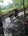 It is dark and slippery in the woods  		CREDITS: Rob Jones  		TITLE: Bromont Canada Cup  		COPYRIGHT: Rob Jones