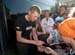Tyder Hesjedal signs autographs 		CREDITS:  		TITLE: 2011 Tour de France 		COPYRIGHT: © Casey B. Gibson 2011