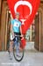 Race leader Alexander Efimkin poses with the Turkish flag  		CREDITS: Rob Jones  		TITLE: Tour of Turkey  		COPYRIGHT: Rob Jones/www.canadiancyclist.com