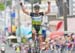 Arms raised after racing 130 kilometers, Langley