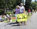 Adam de Vos parents were out to support their son - locals made the signs when they found out the family was staying in host housing 		CREDITS:  		TITLE: Tour de Delta 		COPYRIGHT: Rob Jones/www.canadiancyclist.com 2013 -copyright -All rights retained - n