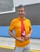 Announcer Randy Ferguson shows off his tie... 		CREDITS:  		TITLE: 2015 ParaPan Am 		COPYRIGHT: Rob Jones/www.canadiancyclist.com 2015 -copyright -All rights retained - no use permitted without prior, written permission