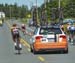 Silber getting a little help from the team car 		CREDITS:  		TITLE: 2015 Road Nationals 		COPYRIGHT: Rob Jones/www.canadiancyclist.com 2015 -copyright -All rights retained - no use permitted without prior, written permission