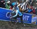 Eli Iserbyt (Bel) tangles with a fans flag 		CREDITS:  		TITLE: 2018 Cyclo-cross World Championships, Valkenburg NED 		COPYRIGHT: Rob Jones/www.canadiancyclist.com 2018 -copyright -All rights retained - no use permitted without prior; written permission